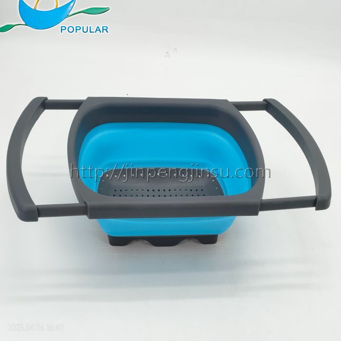 Collapsible colander basket with drag handle