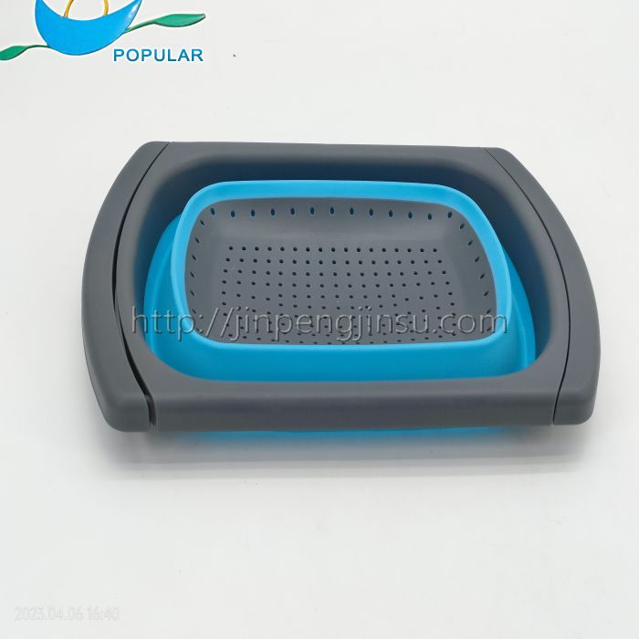 Collapsible colander basket with drag handle